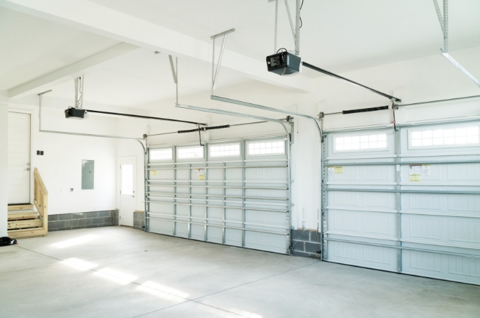 Interior of a garage with single and double garage doors